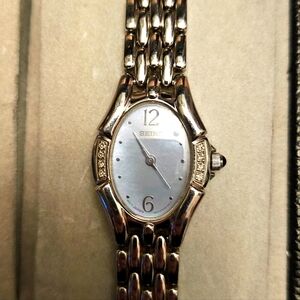 Seiko mother of pearl center, with diamonds